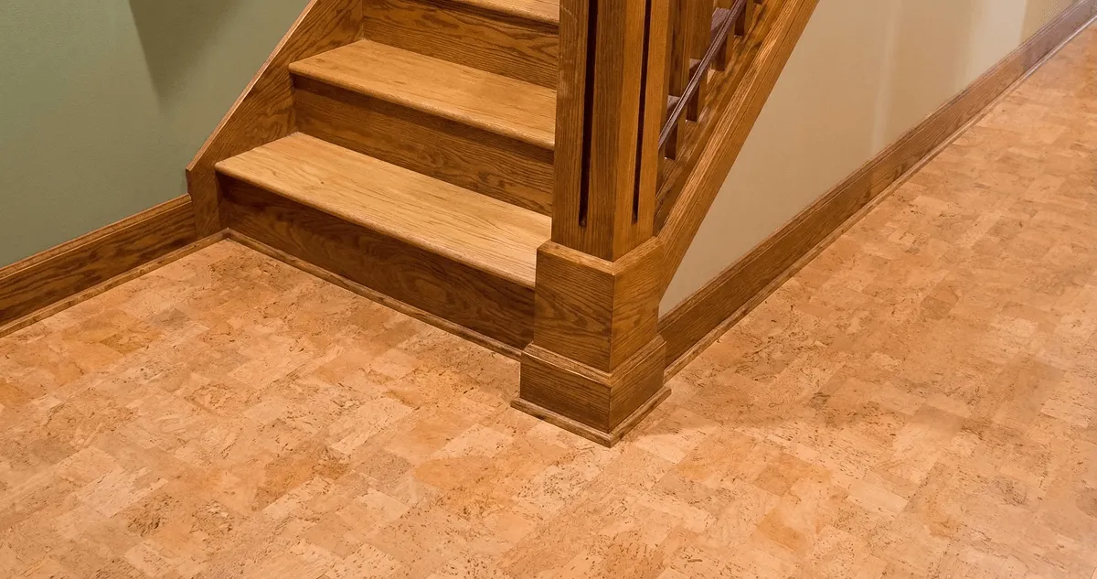 End of a staircase with cork flooring in Aurora, IL