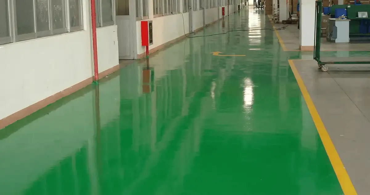 A factory floor professionally covered and marked with epoxy flooring in Aurora, IL