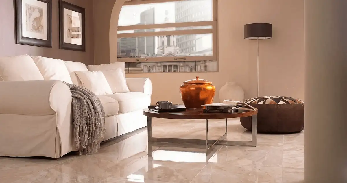 Modern living room with professionally installed marble flooring, a beige sofa, coffee table in Aurora, IL