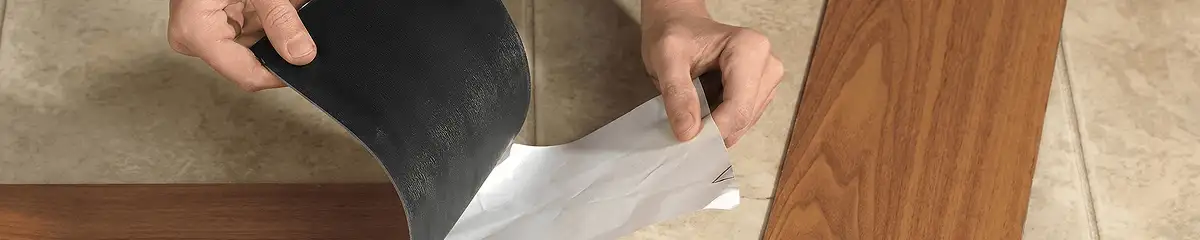 A professional installing vinyl flooring in Aurora, IL